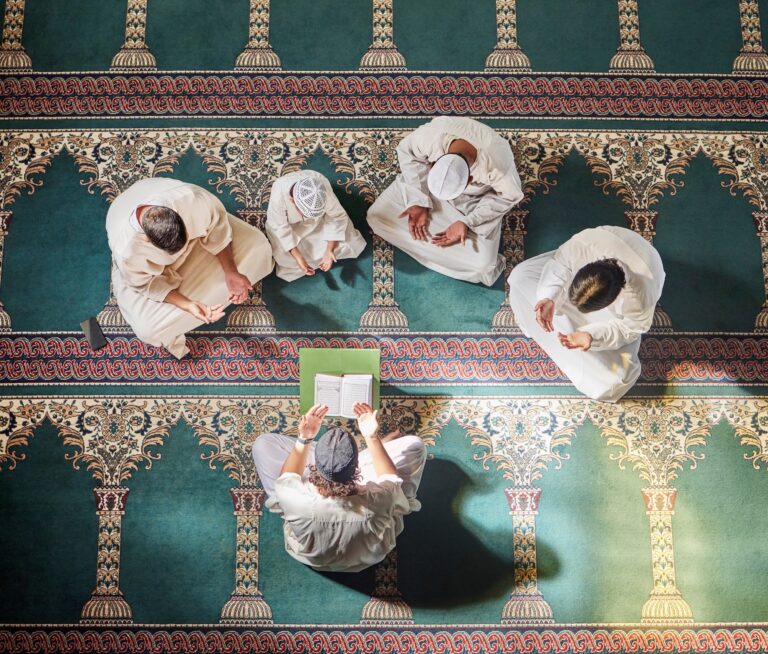 Above mosque carpet, group and quran for faith, religion and prayer for gratitude, peace or mindful