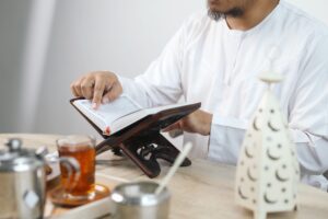 Muslim Man Reciting Quran
